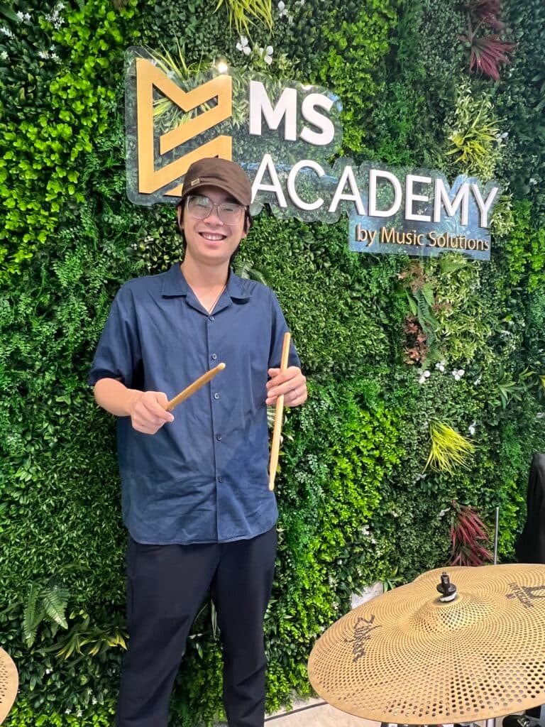 Portrait of Yunqi, drums educator and music director at MS Academy